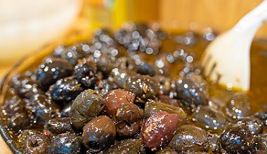Aceitunas Negras descarozada condimentadas